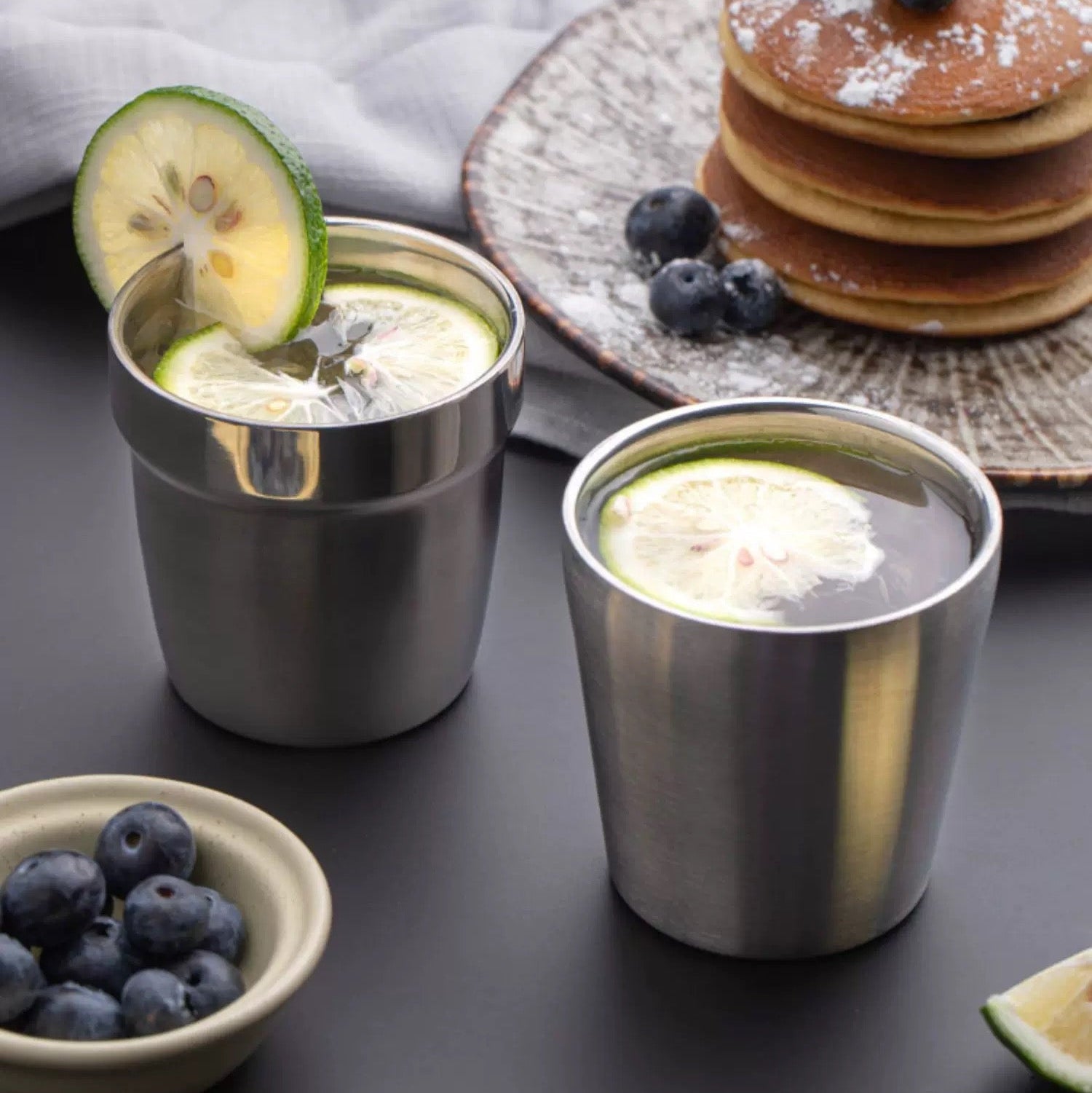 Two stainless steel cups 